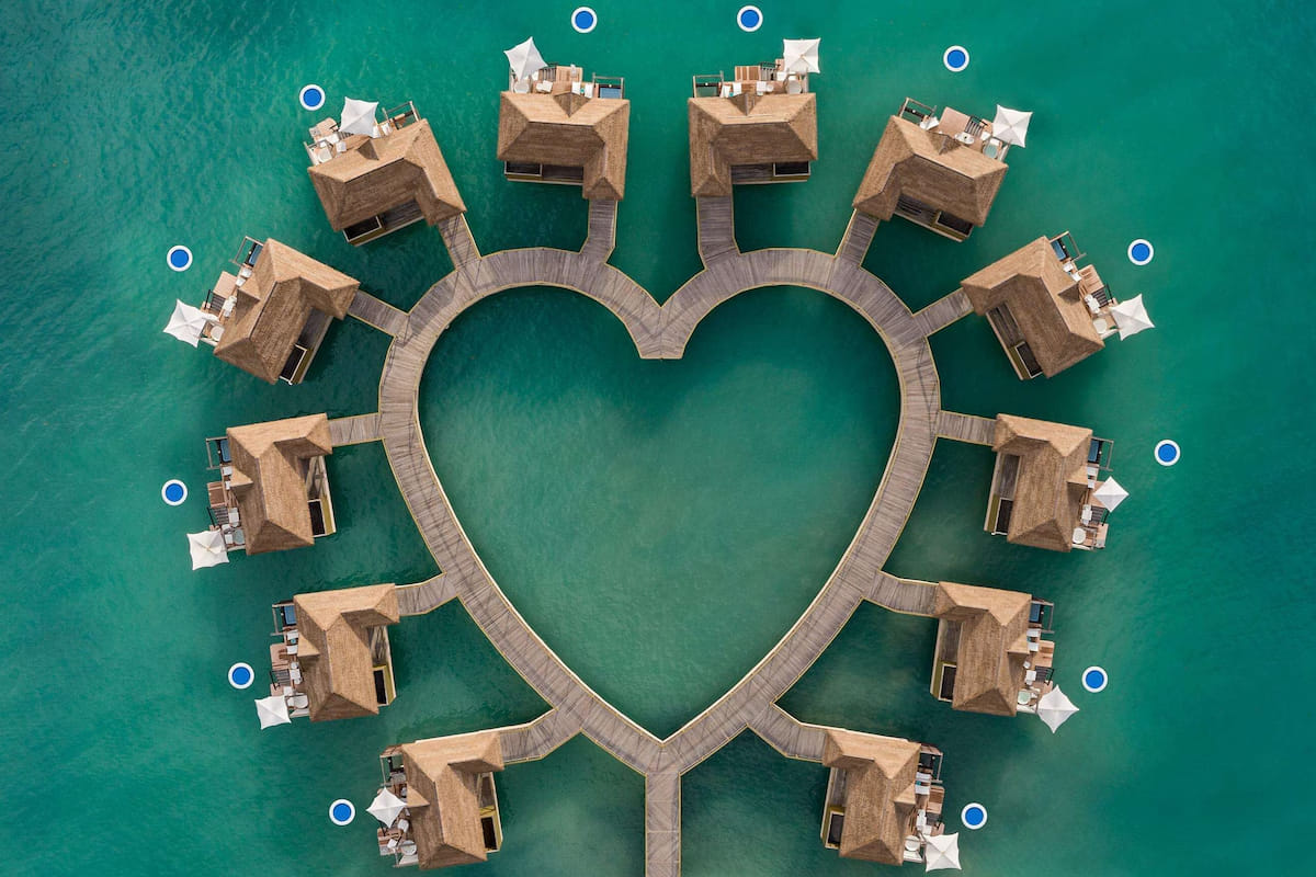Heart-shaped arrangement of Sandals South Coast overwater villas in Jamaica