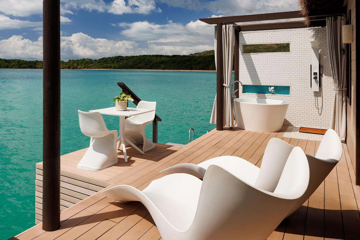 Private deck overlooking the Caribbean Sea at a Sandals South Coast overwater villa